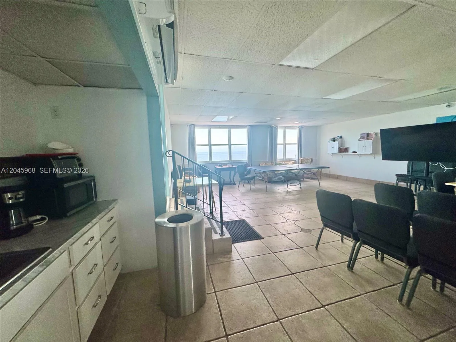 COMMUNITY ROOM, PING PONG, KITCHEN