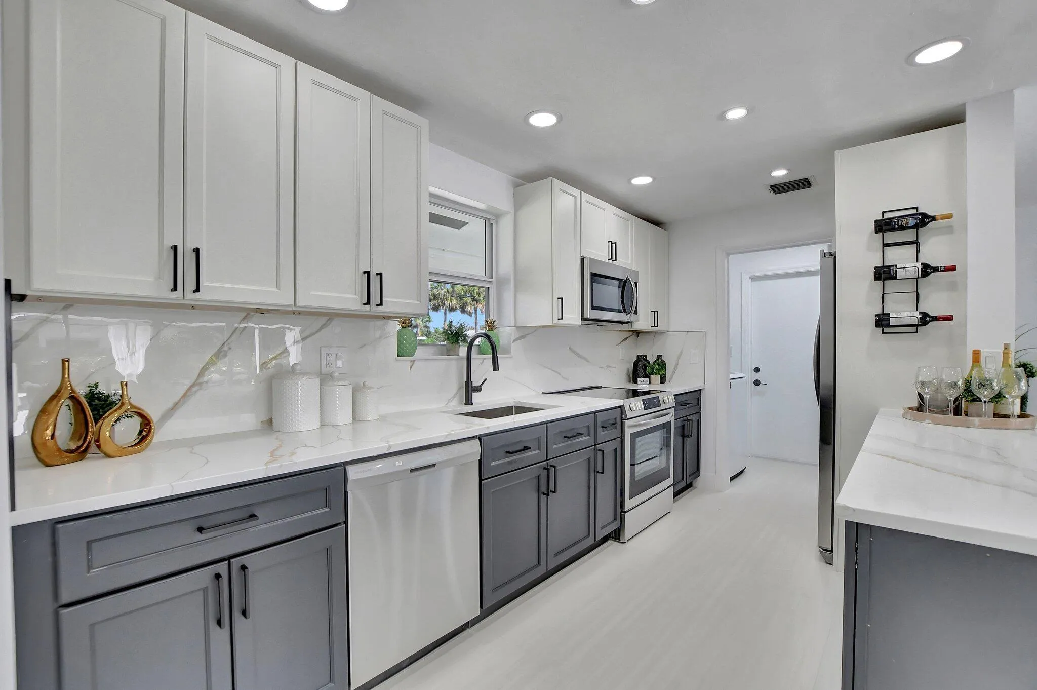 Gourmet Kitchen leads to Utility Room