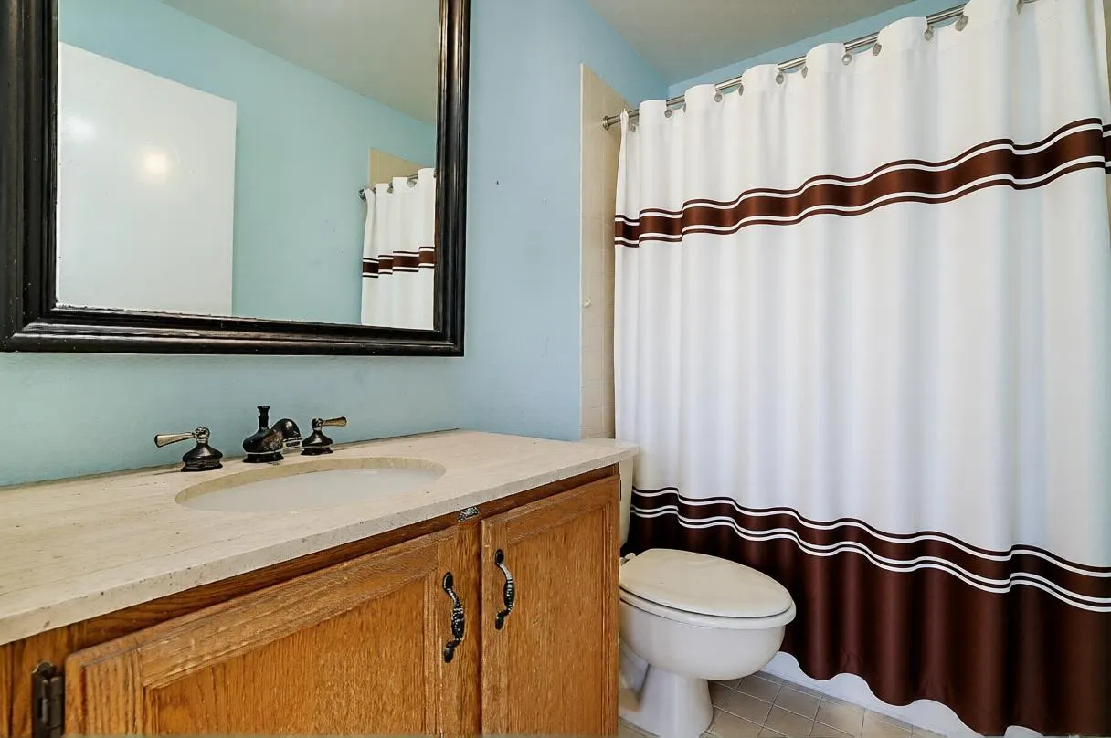 Bathroom with shower curtain