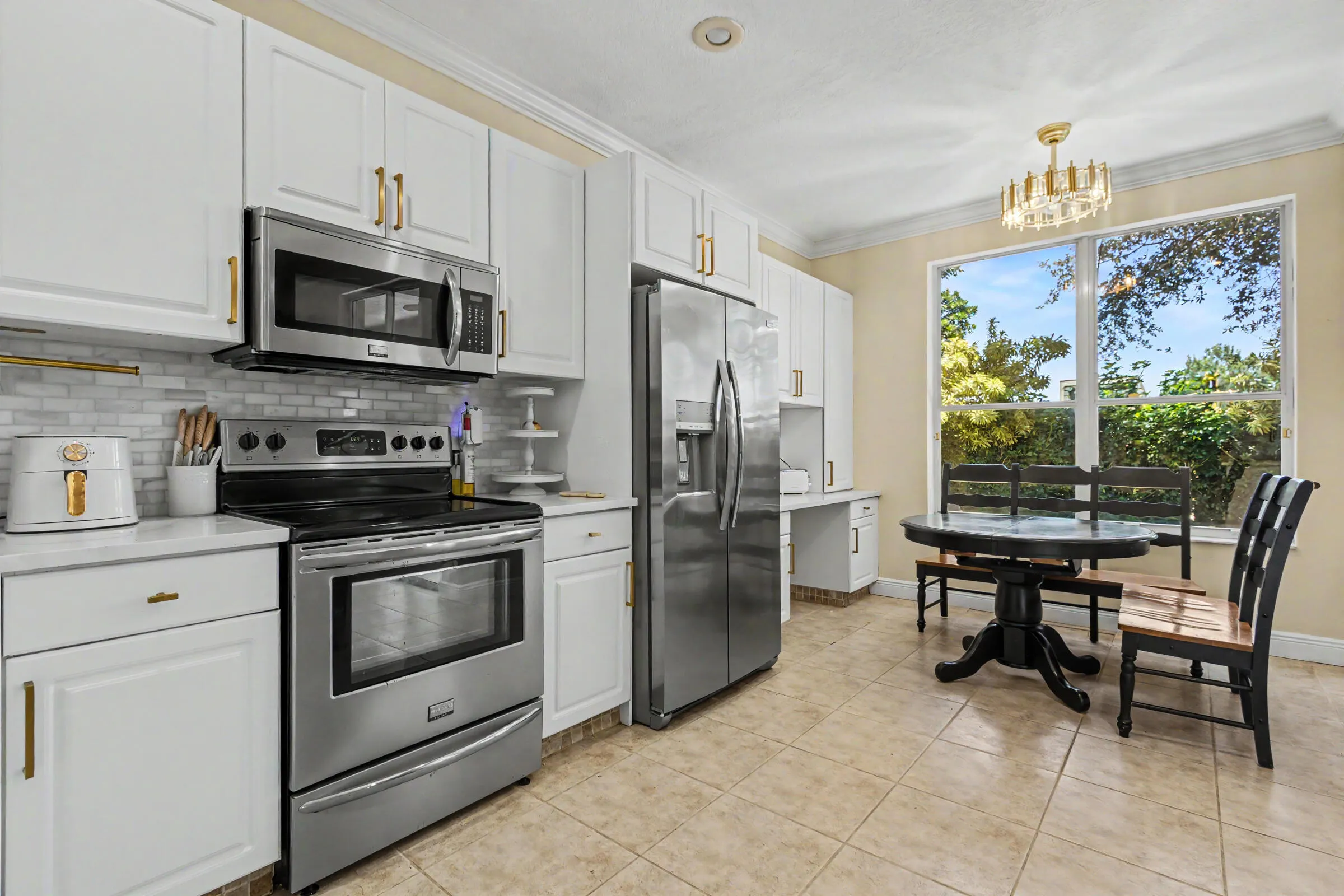 kitchen with eating area and quartz counters-stainless steel appliances