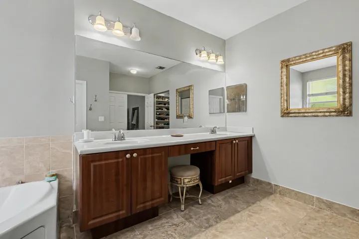 master bedroom with dual sinks