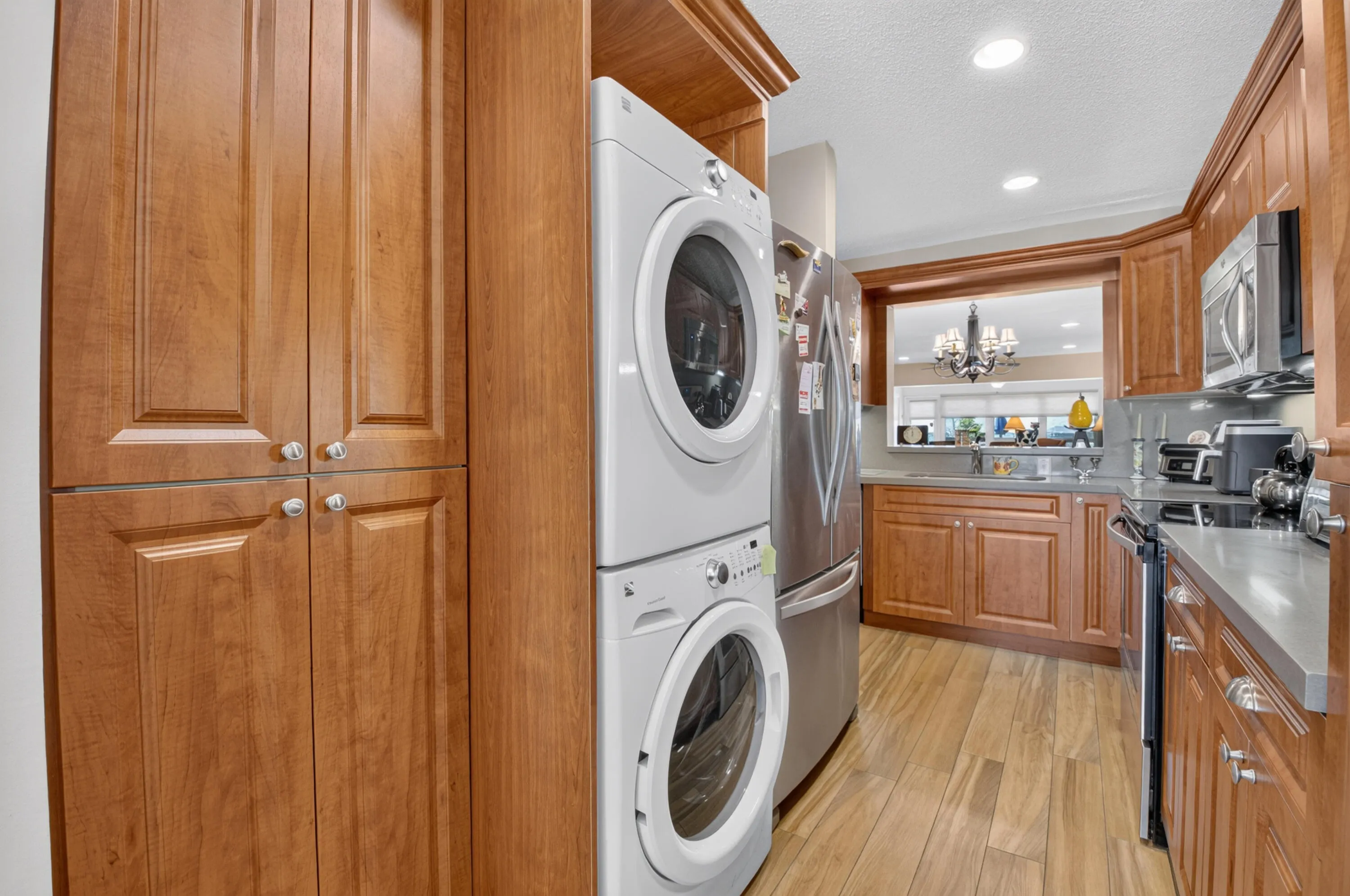 KITCHEN WITH WASHER, DRYER, ULILITY CLOSET AND PANTRYCLOSET