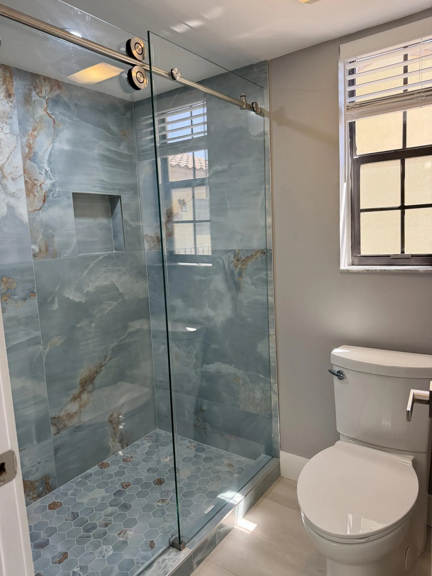 Gorgeous new master shower area and toilet