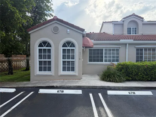 With 2 assigned spaces additional guest spaces on the side and front of unit
