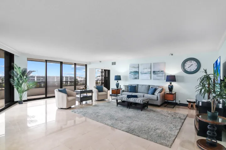 Living Room 1 - All sliders have electric shades.