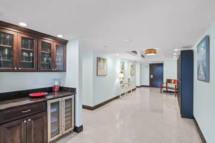 Condo Entrance into Huge Lobby (see built-in bar)