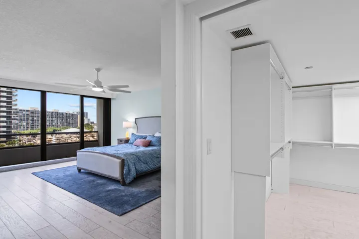 Primary Bedroom peeking into Walk-In Closet