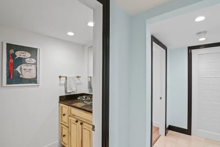1/2 bath for guests from hallway leading to both guest bedrooms