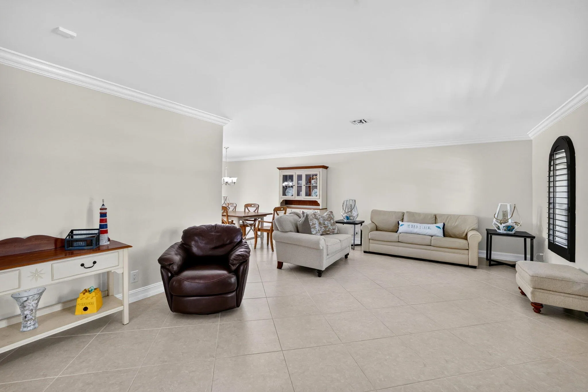 ADD_04_Living_Room_Dining_Pool_View