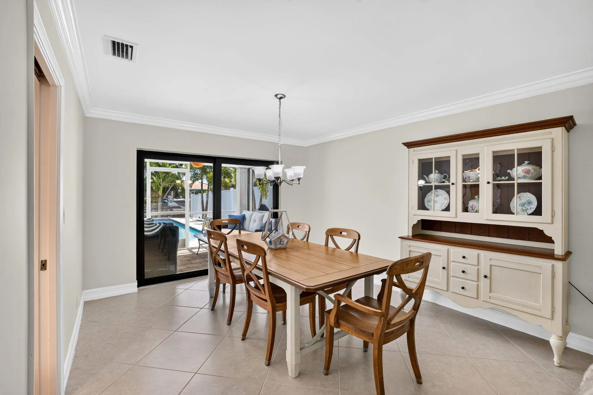 ADD_16_Dining_Room_Pool_Patio_View