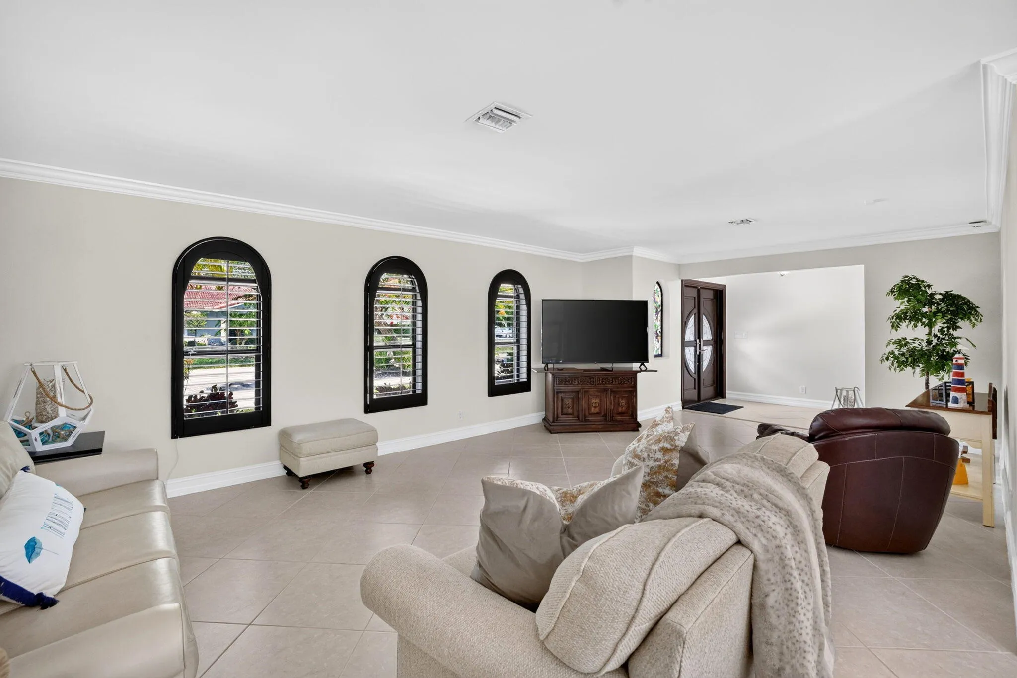 ADD_07_Living_Room_Arched_Window_View