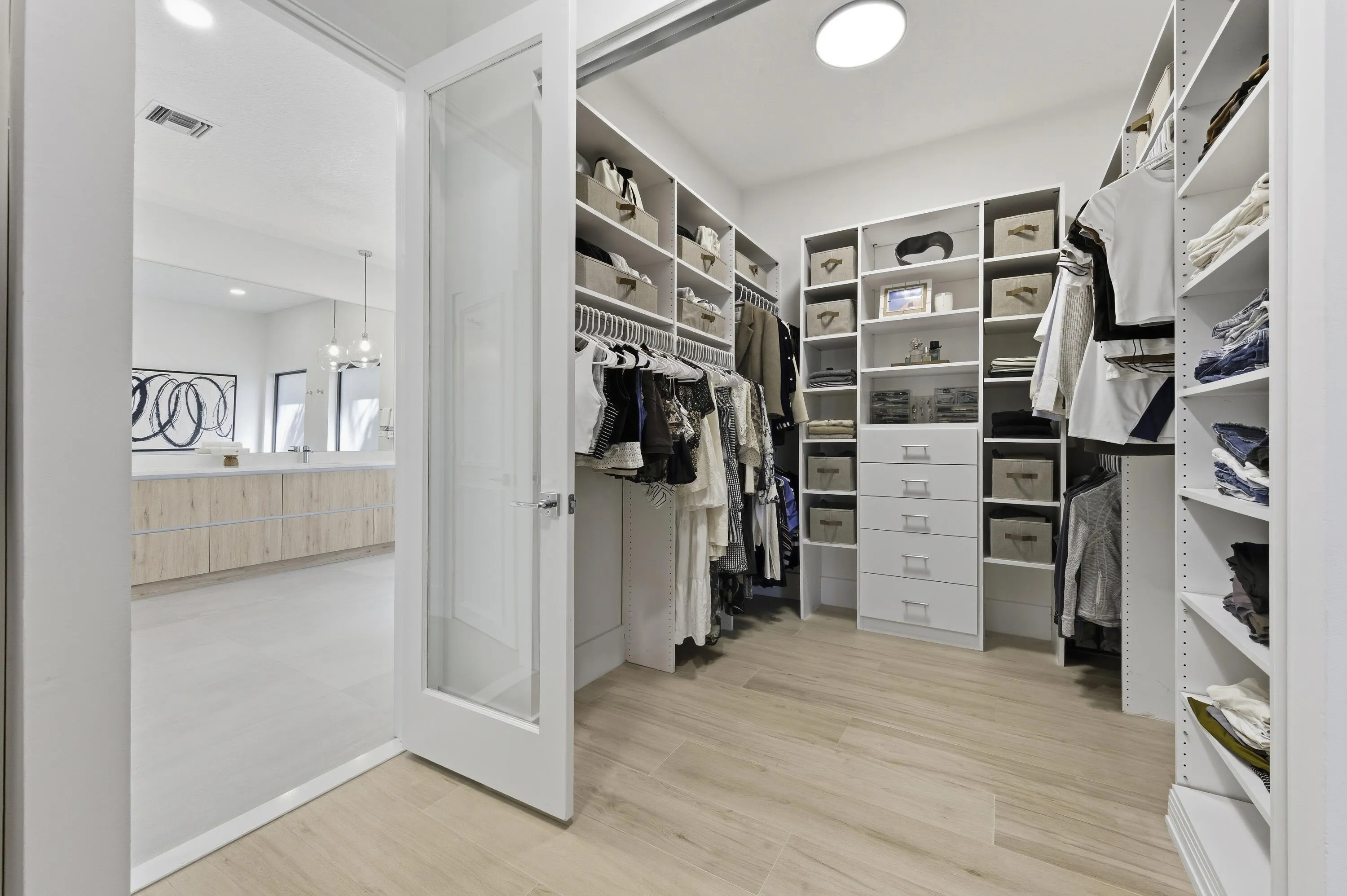 PRIMARY WALK-IN CLOSET - HERS