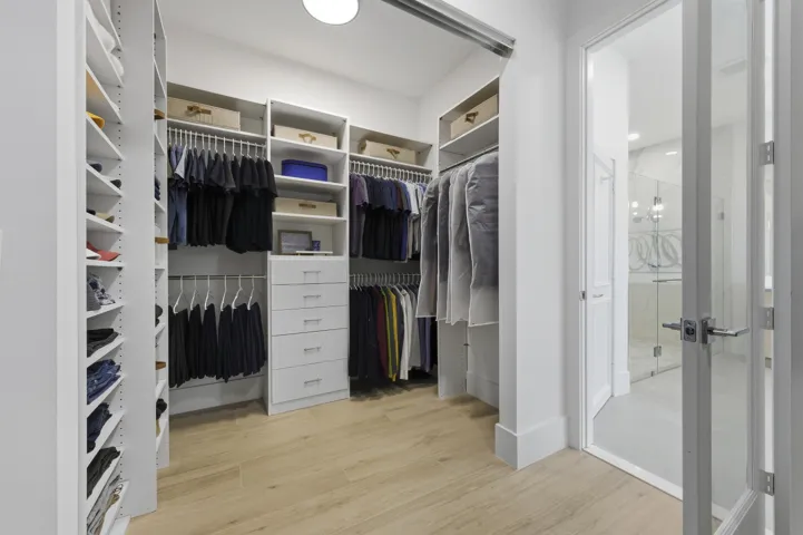 PRIMARY WALK-IN CLOSET - HIS