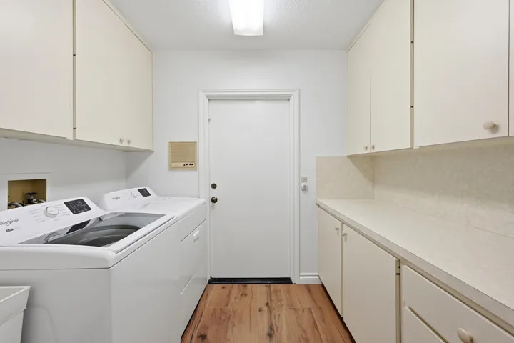 Dedicated laundry room with chute.