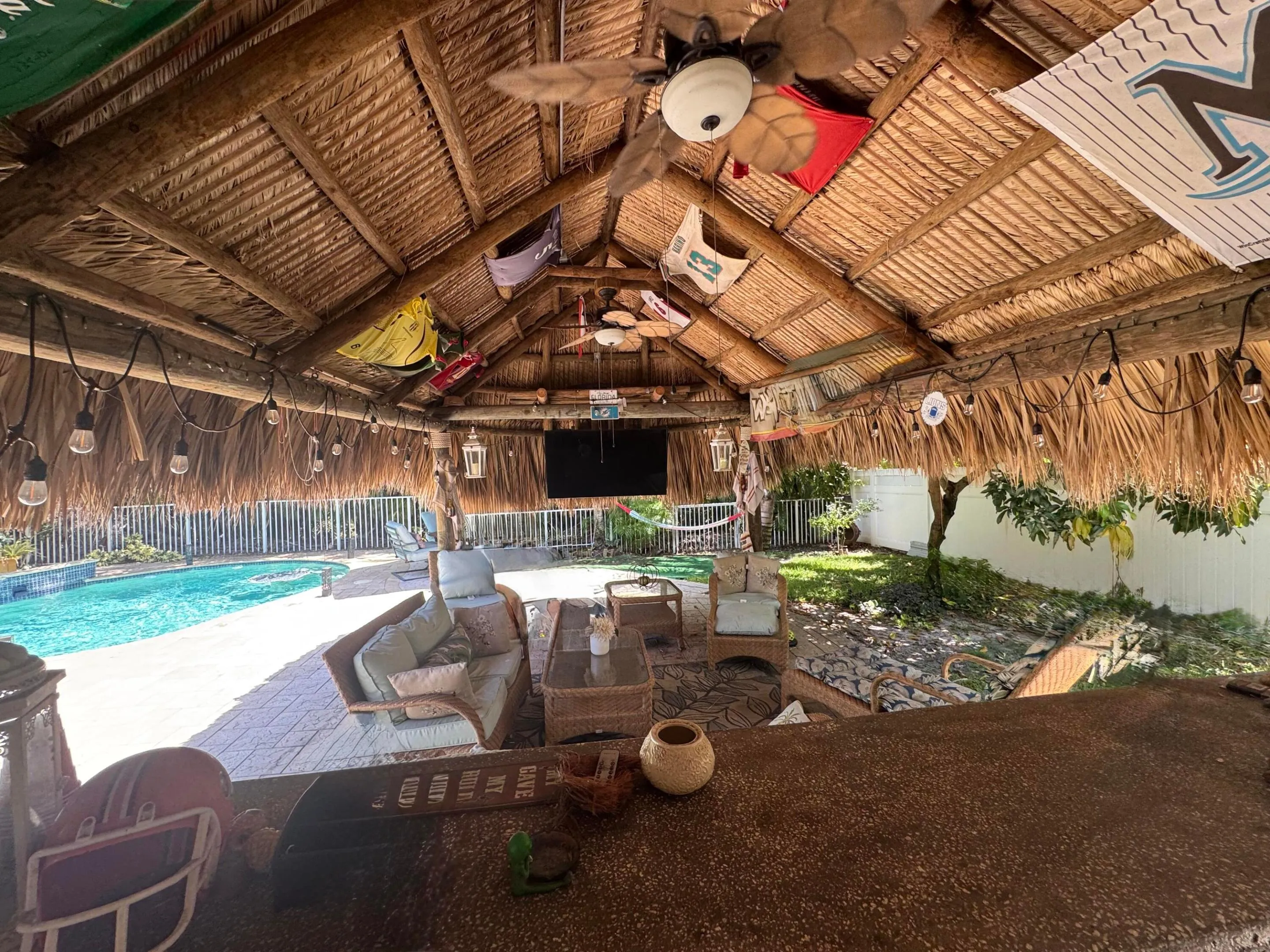 Relax at the bar in your tiki hut