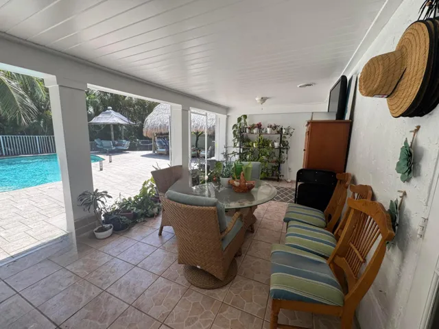large screened patio off primary suite & office
