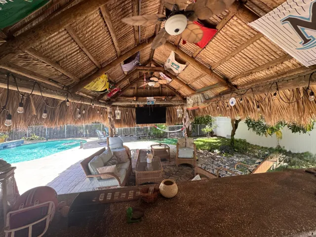 Relax at the bar in your tiki hut
