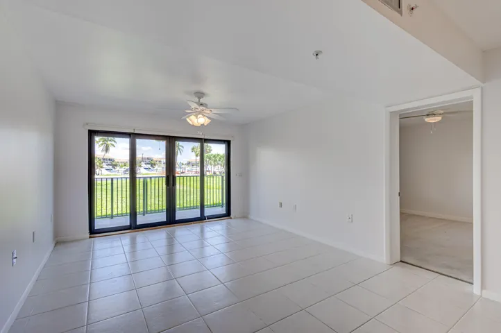Hurricane impact sliders to covered dining alcove patio