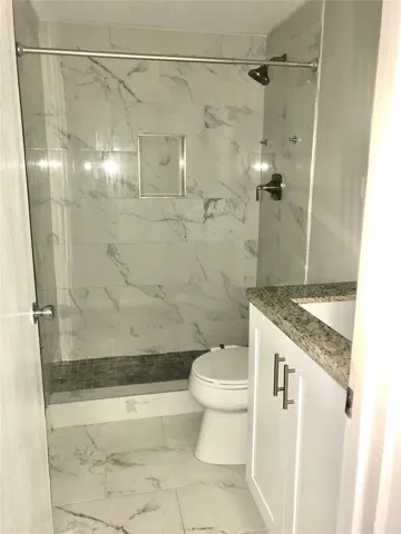 MASTER BATH UPDATE WITH PORCELAIN MARBLE TILE