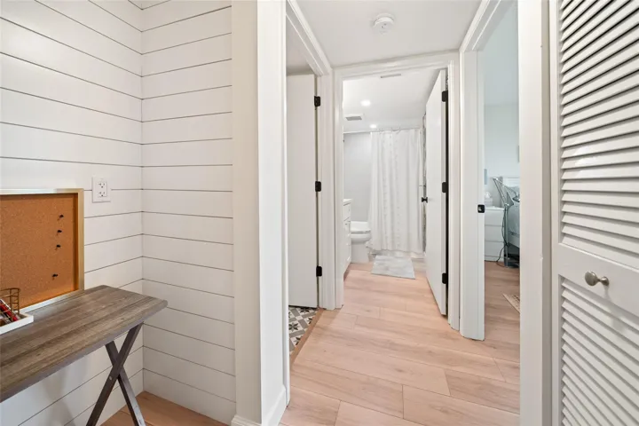 Hallway leading into guest bedroom and bathroom
