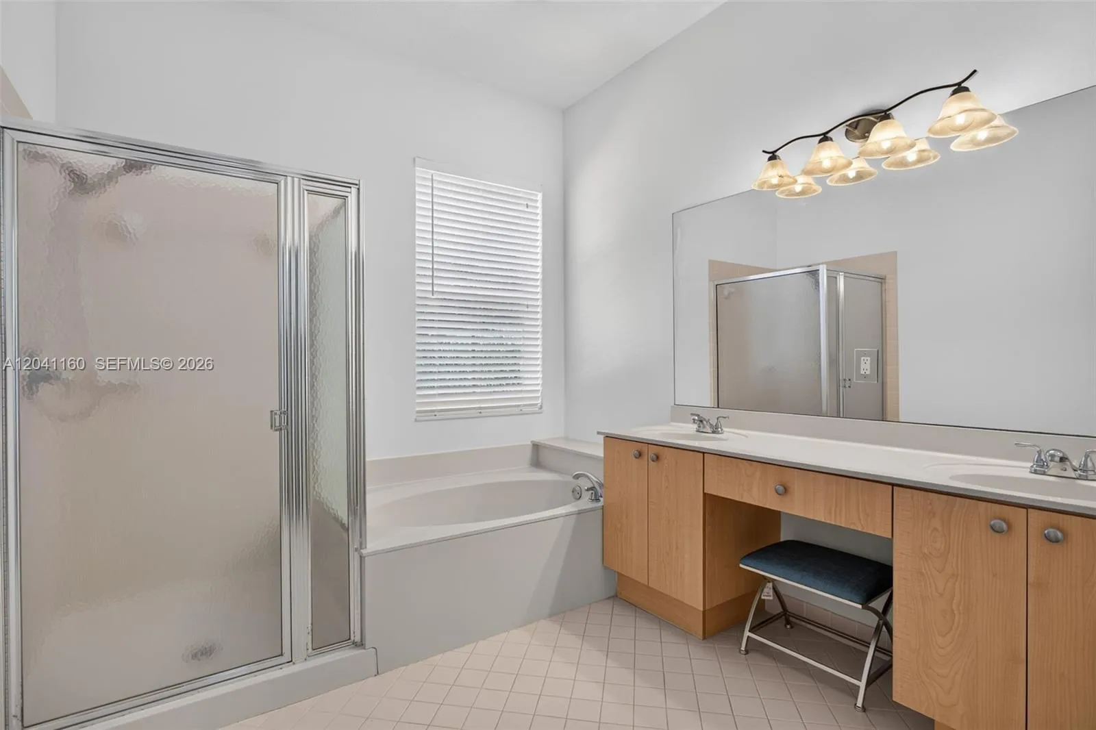 With separate tub and shower.