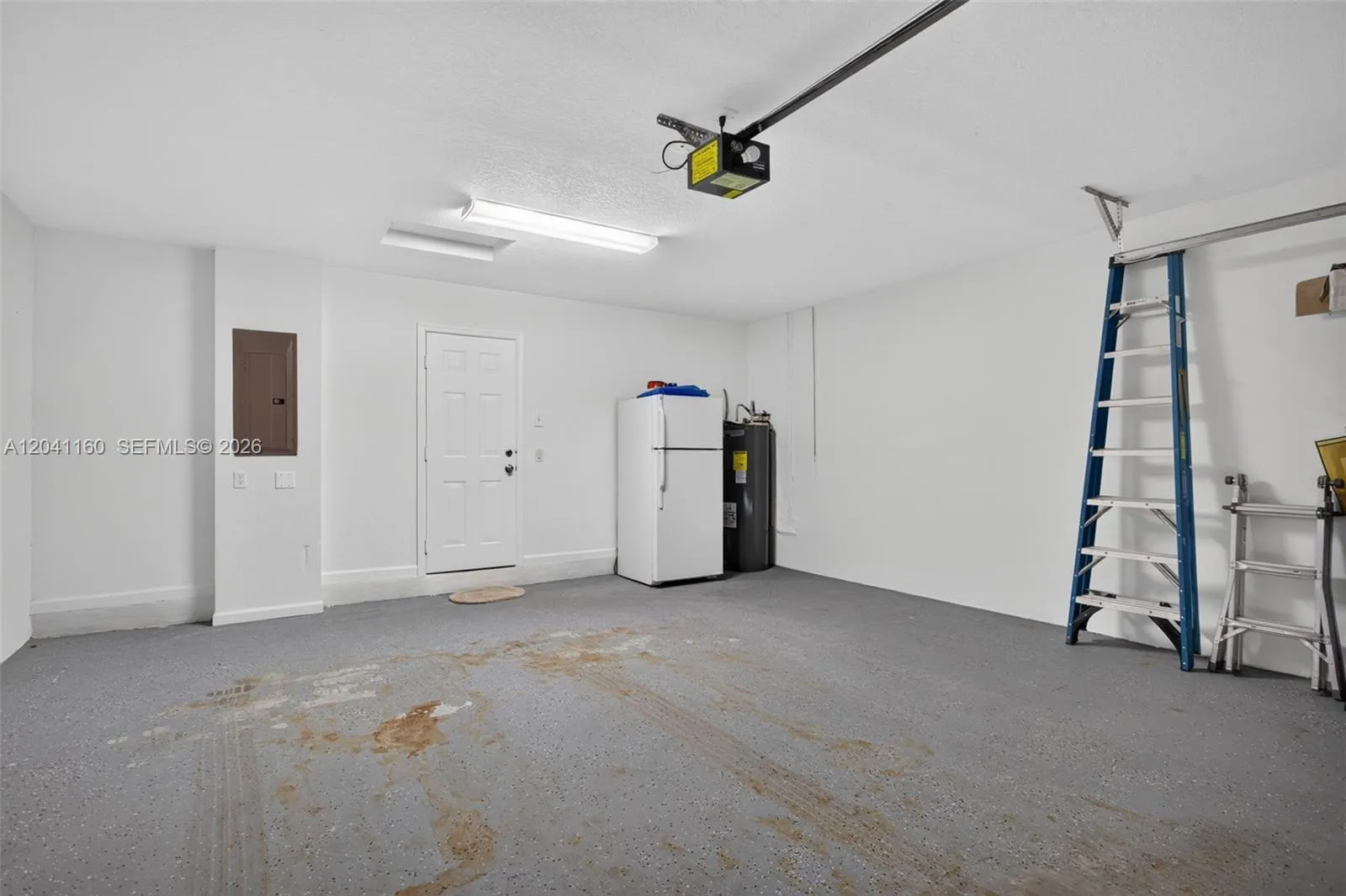 Freshly painted, 2-car garage. With extra refrigerator.