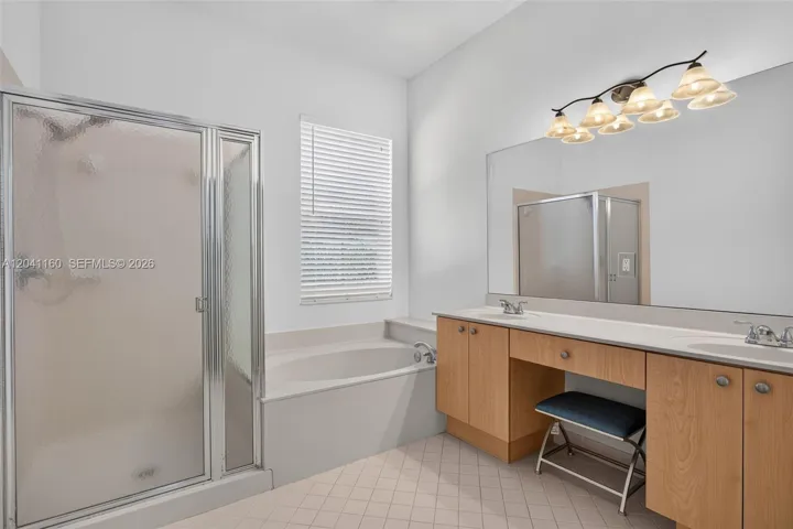 With separate tub and shower.