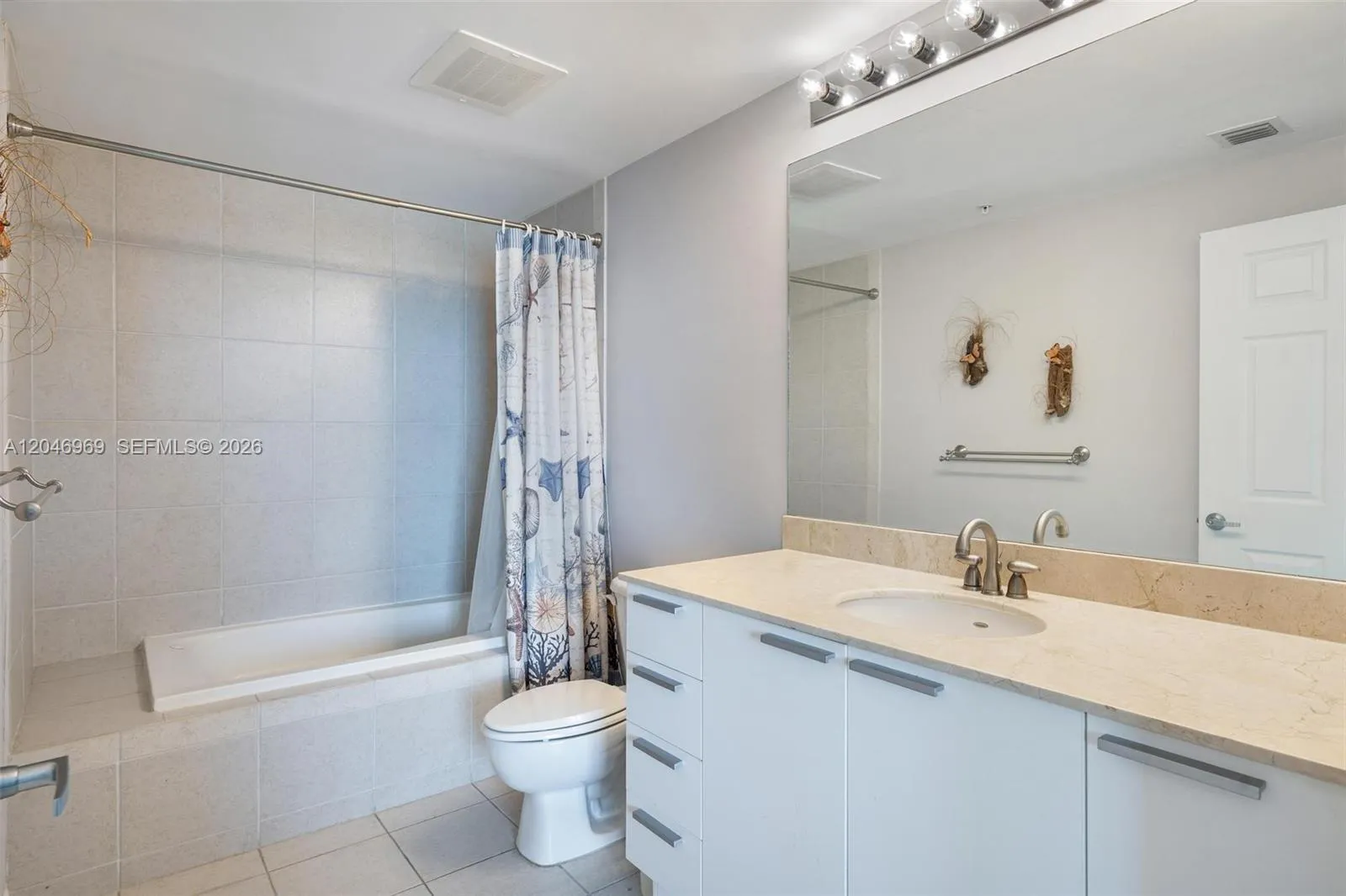 shower tub combo in primary bathroom