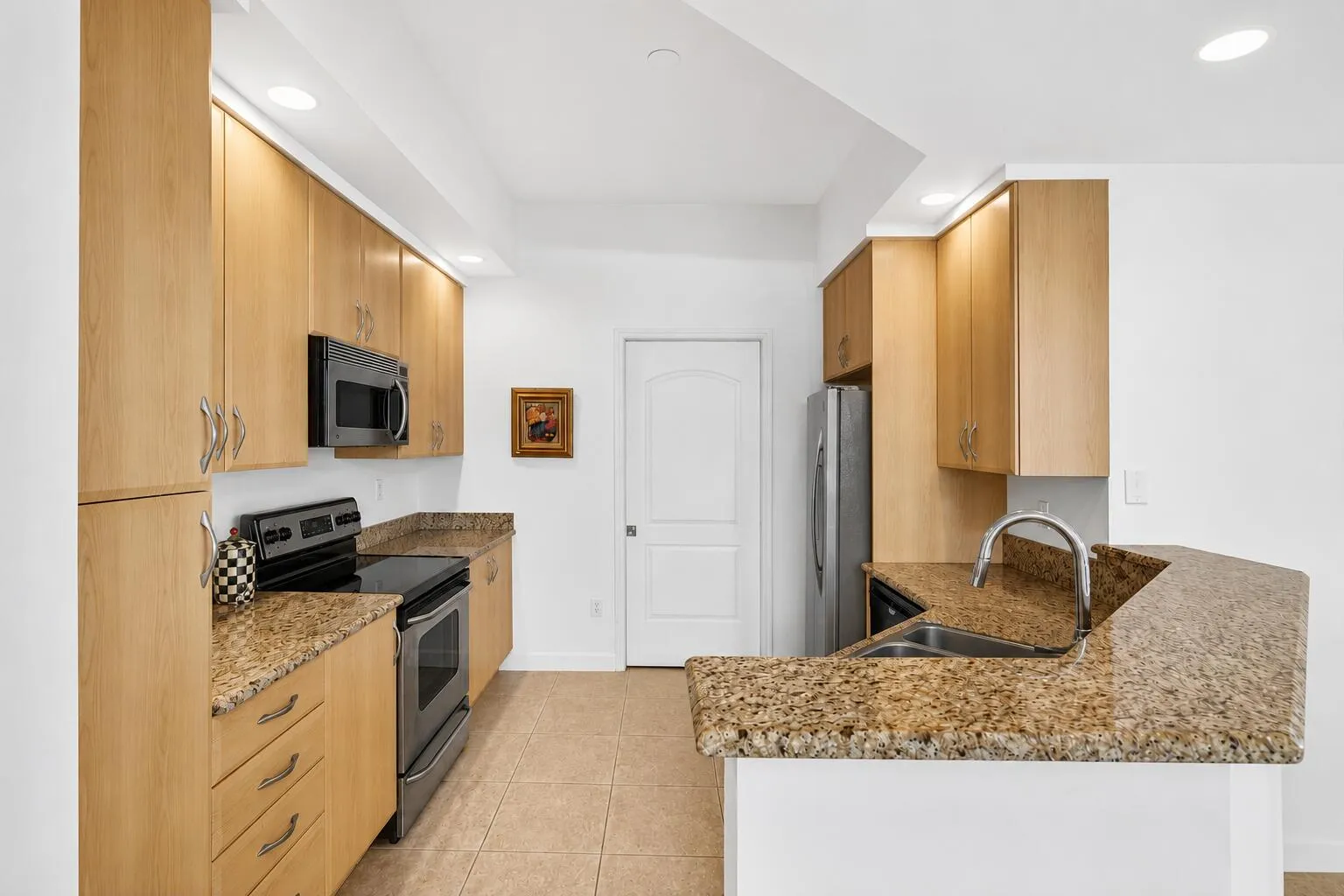 Kitchen w/ Ample Cabinetry