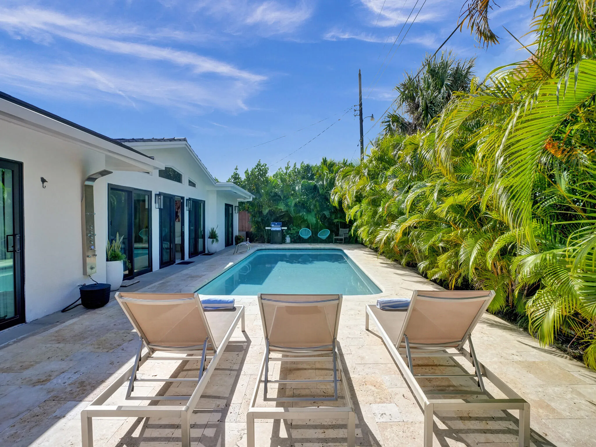 Pool Lounge Features Travertine Deck