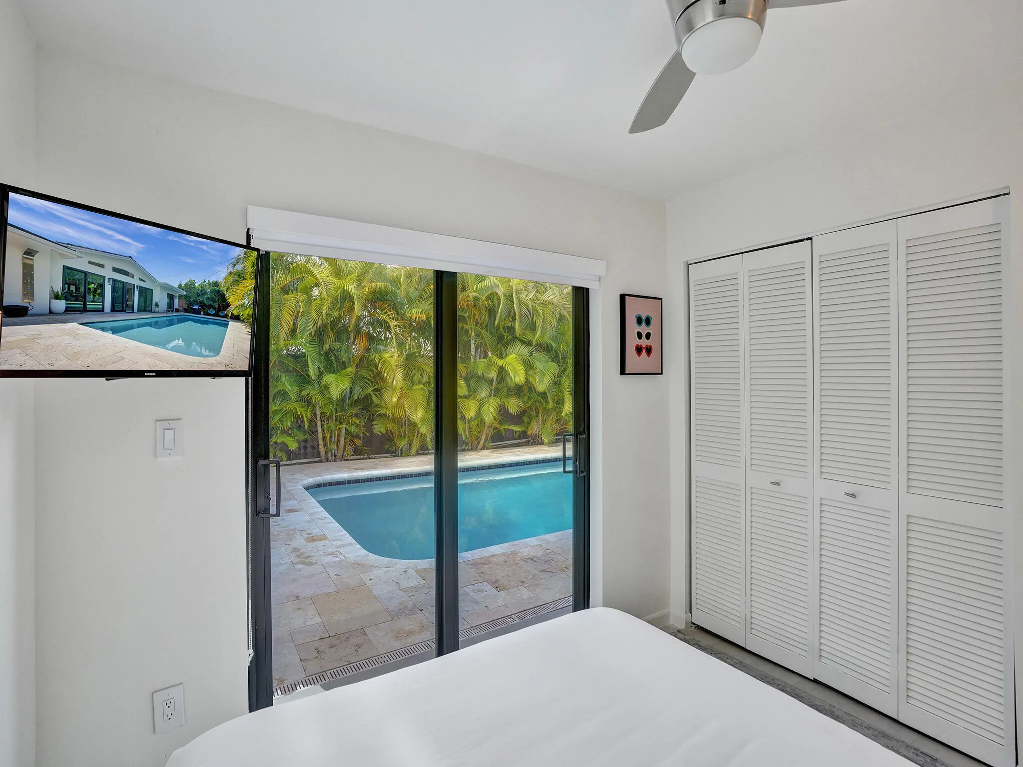 Bedroom Four TV + Pool View