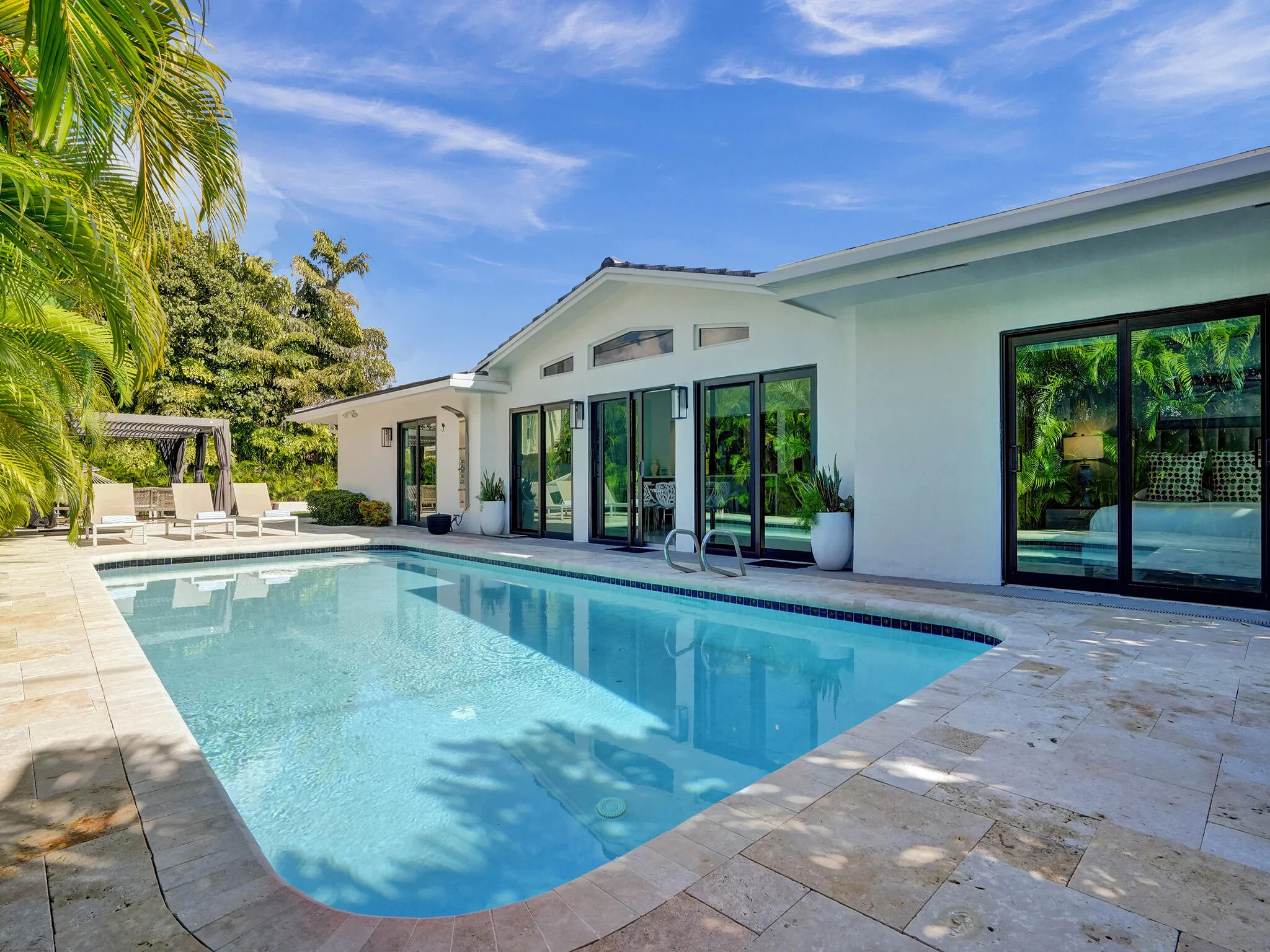 Pool Lounge Features Travertine Deck