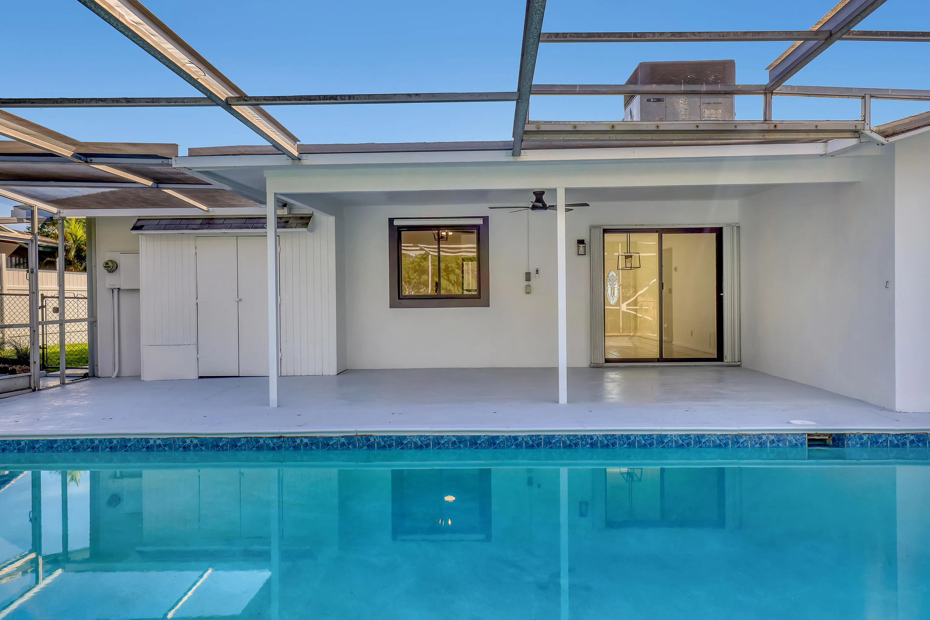 The glow from inside makes the whole back of the house feel warm and inviting.