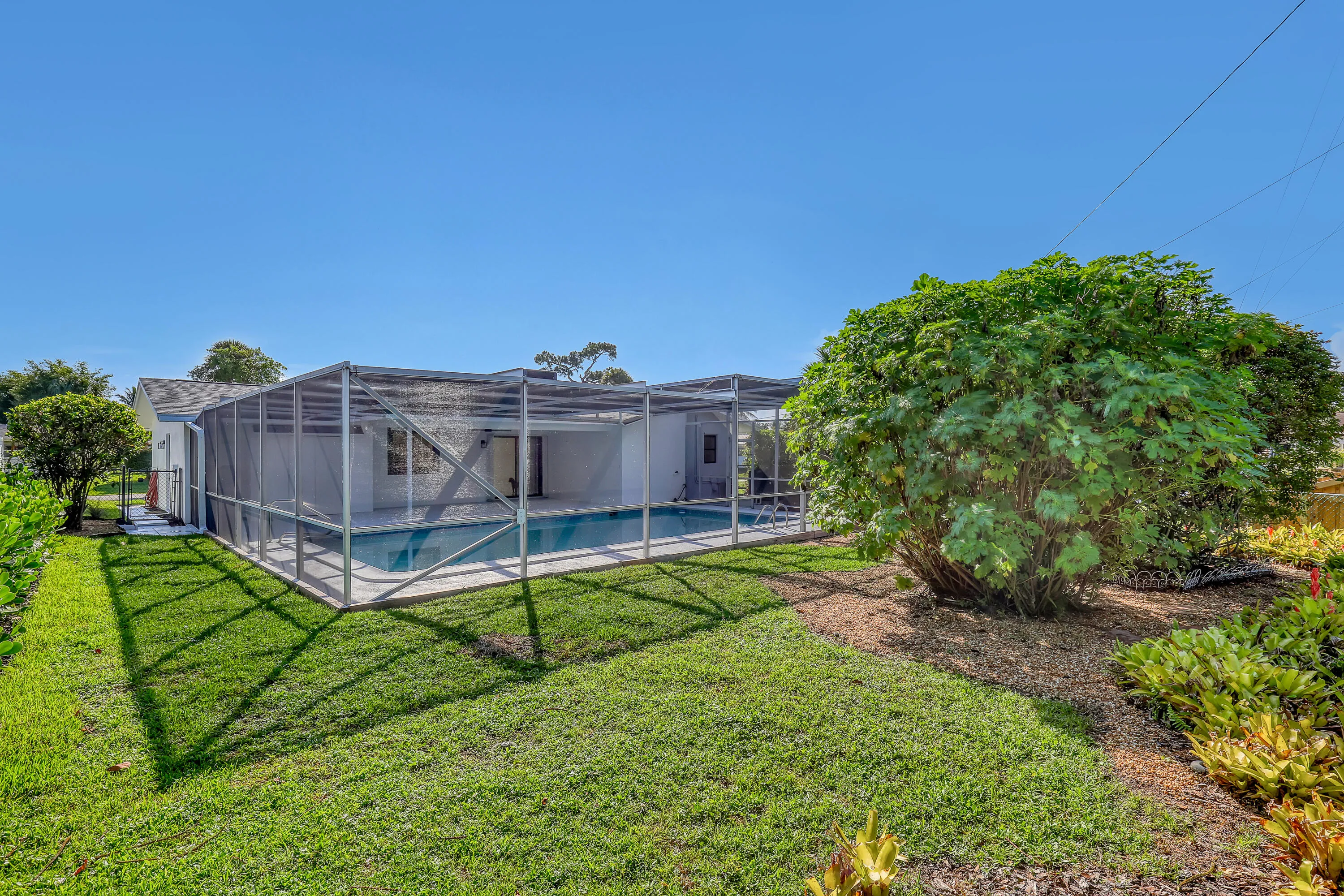 Swim all afternoon, then step out onto the lawn for room to play or just spread out.