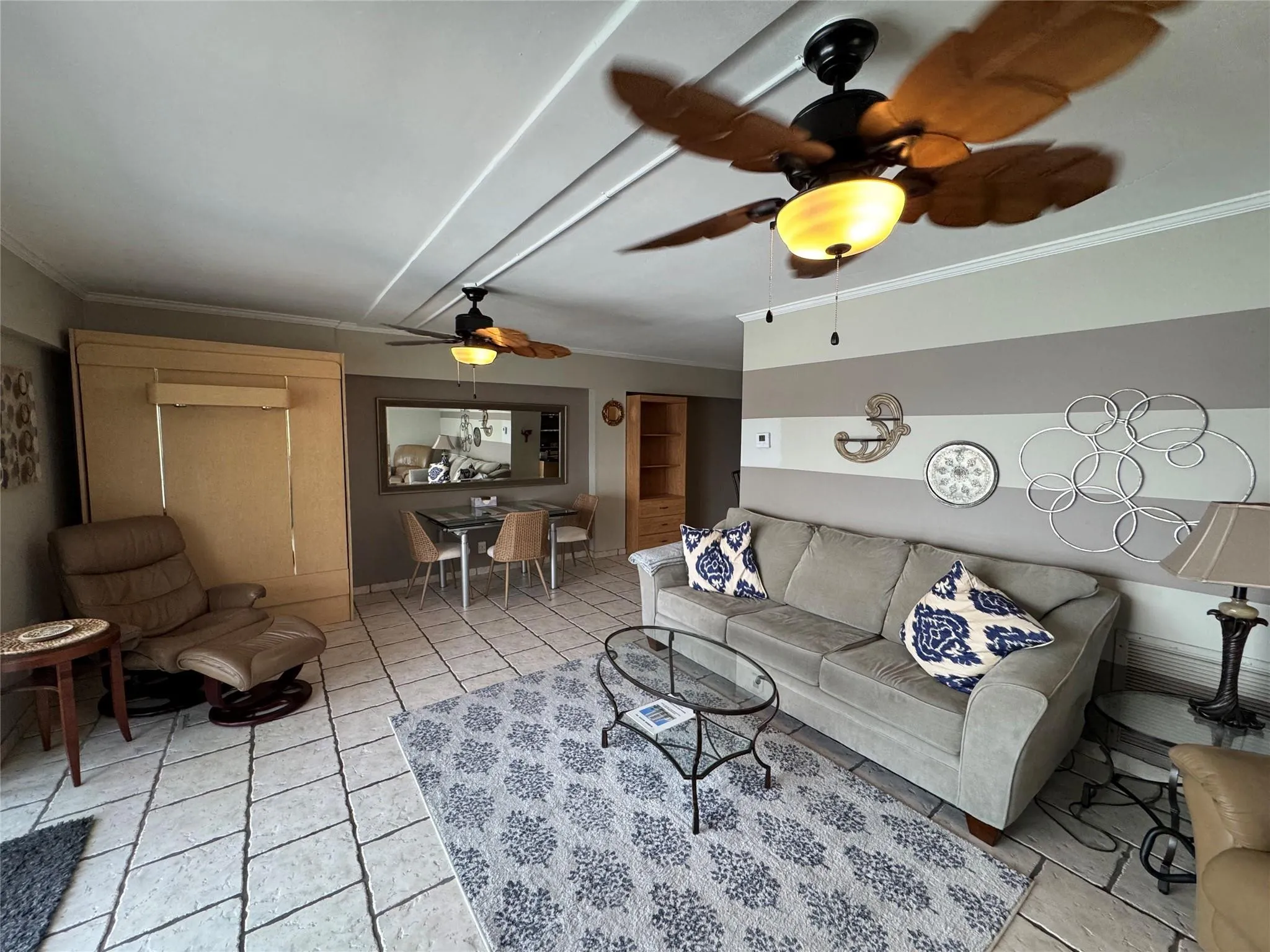 Murphy bed on wall left side of photo