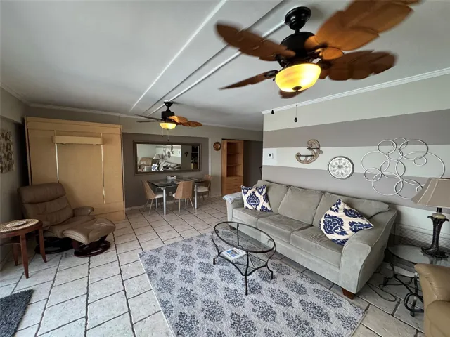 Murphy bed on wall left side of photo