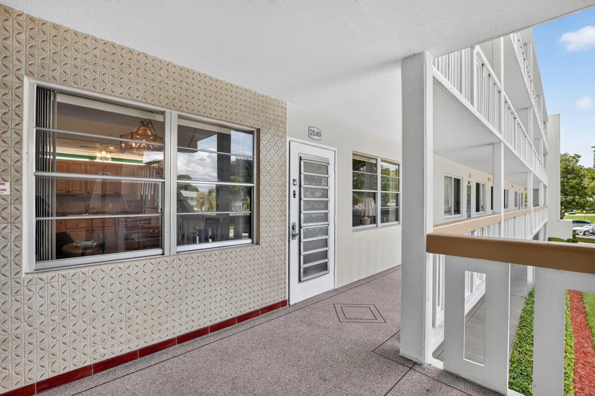 Your front door is conveniently located by the elevator and stairs!