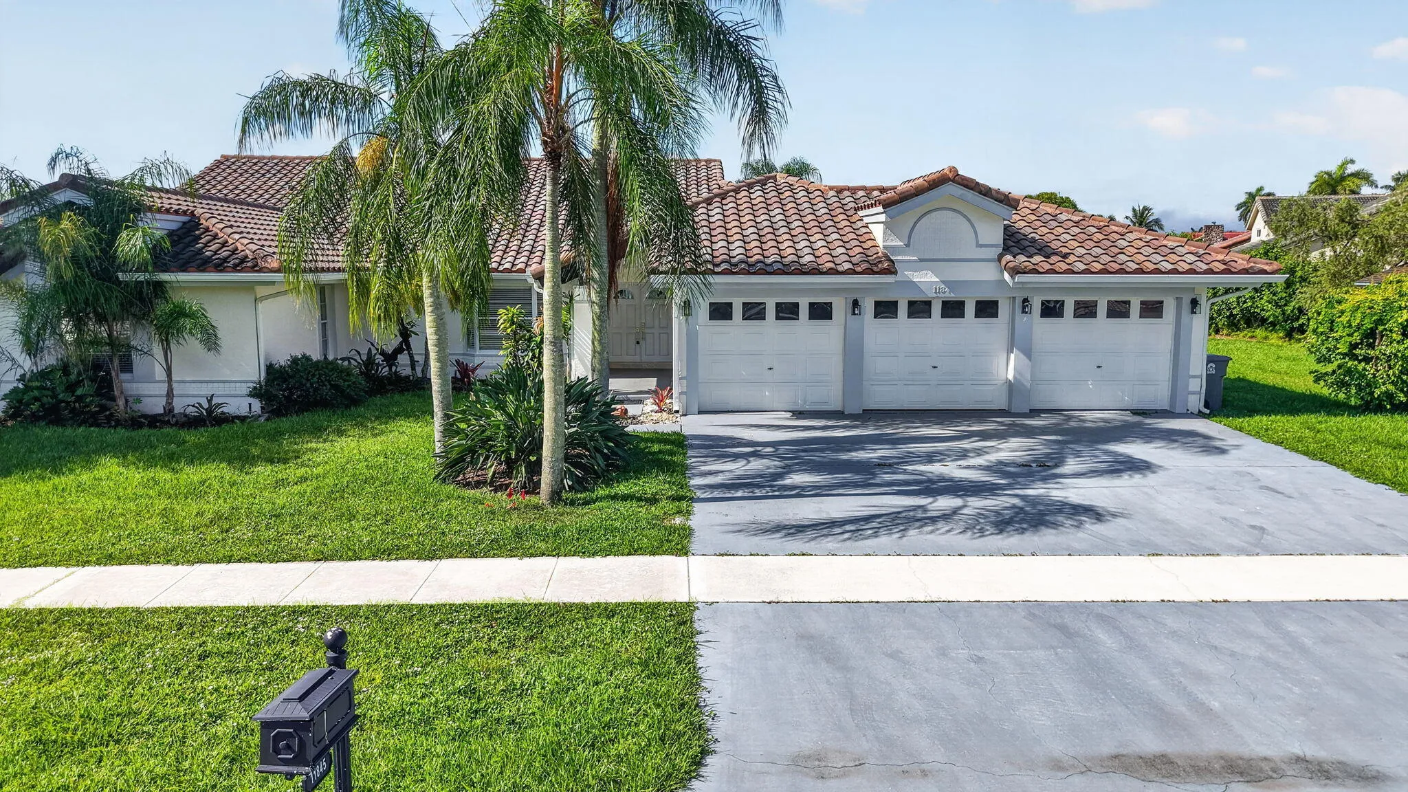 3 car garage long driveway