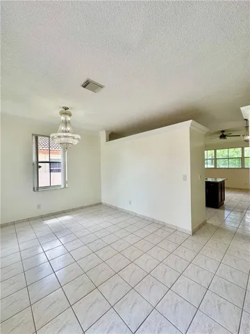 Formal Dining Area & Kitchen Area
