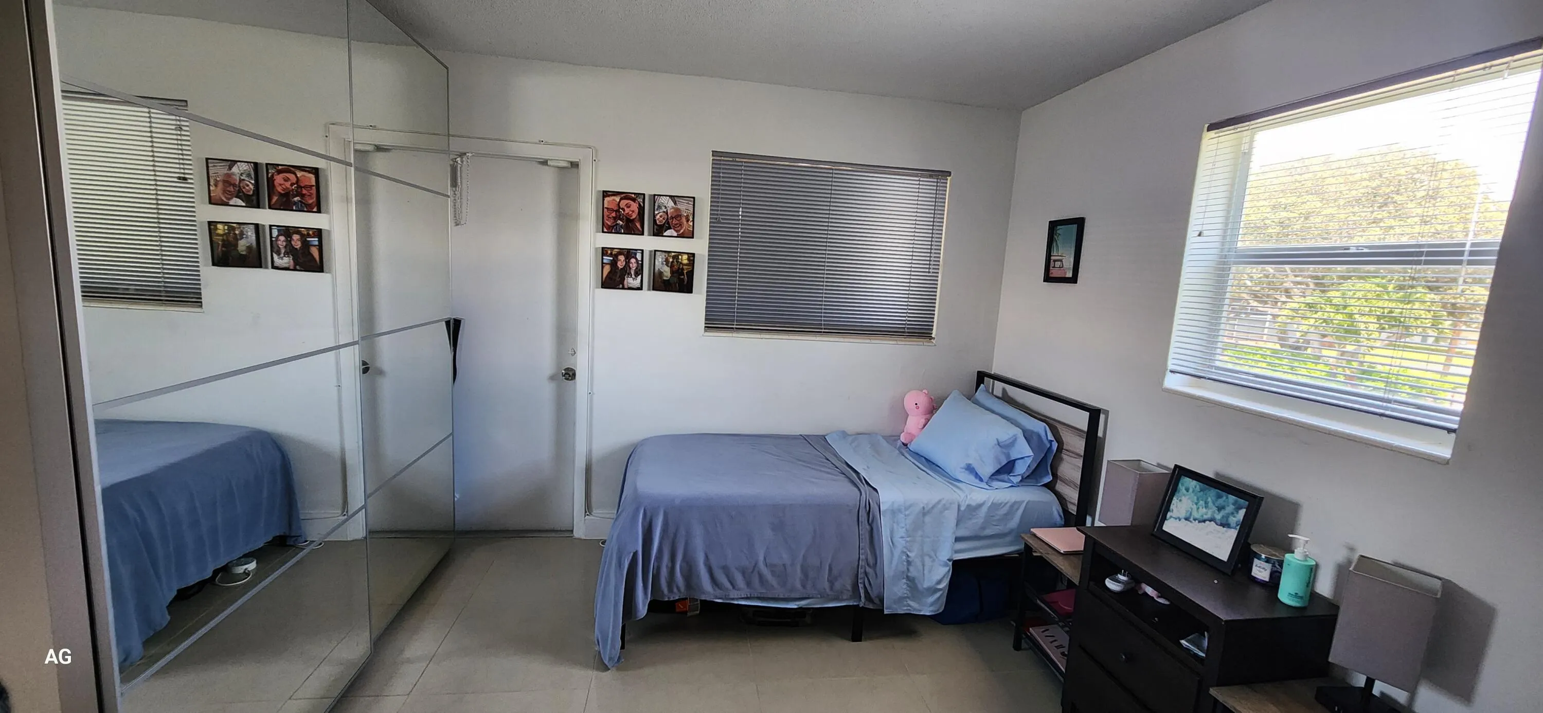 Corner unit- 2nd bedroom with front exit access. Mirrored closet cabinet