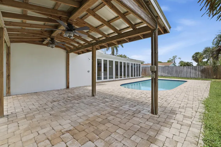 Gazebo with lighting and ceiling fans.