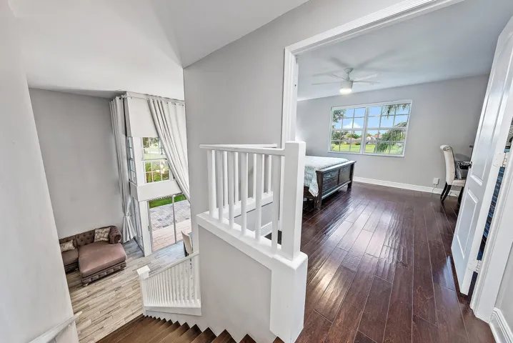 Staircase view of primary bedroom
