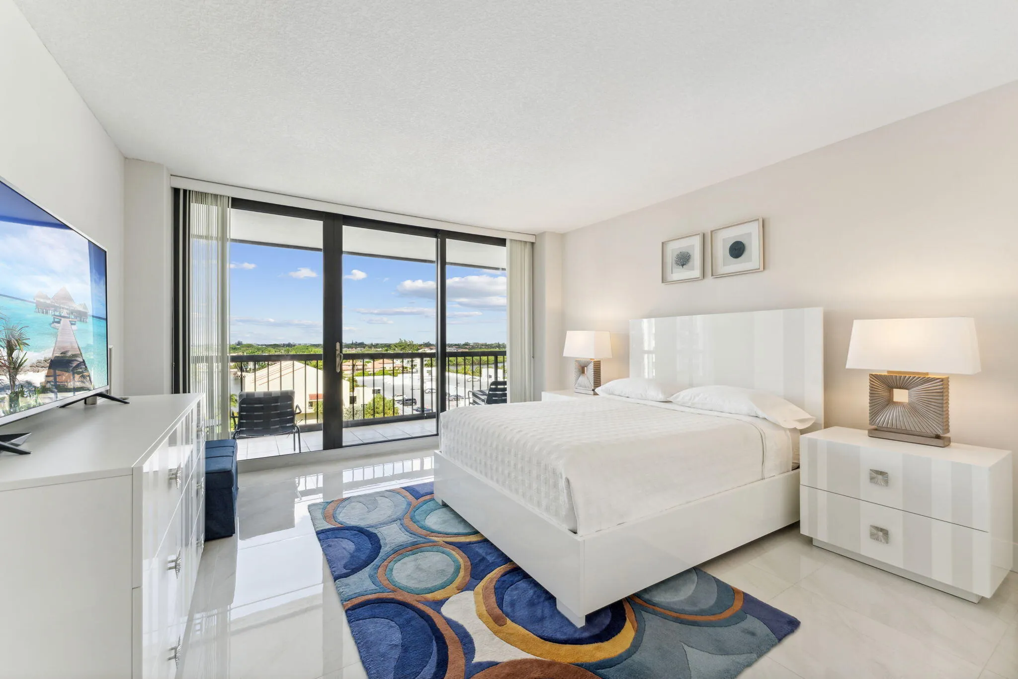 Guest/second bedroom with sliders to balcony