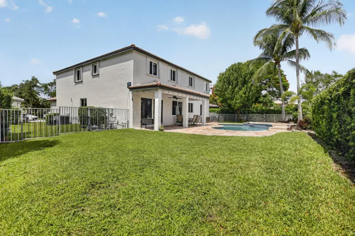 Lots of yard space in addition to pool and patio