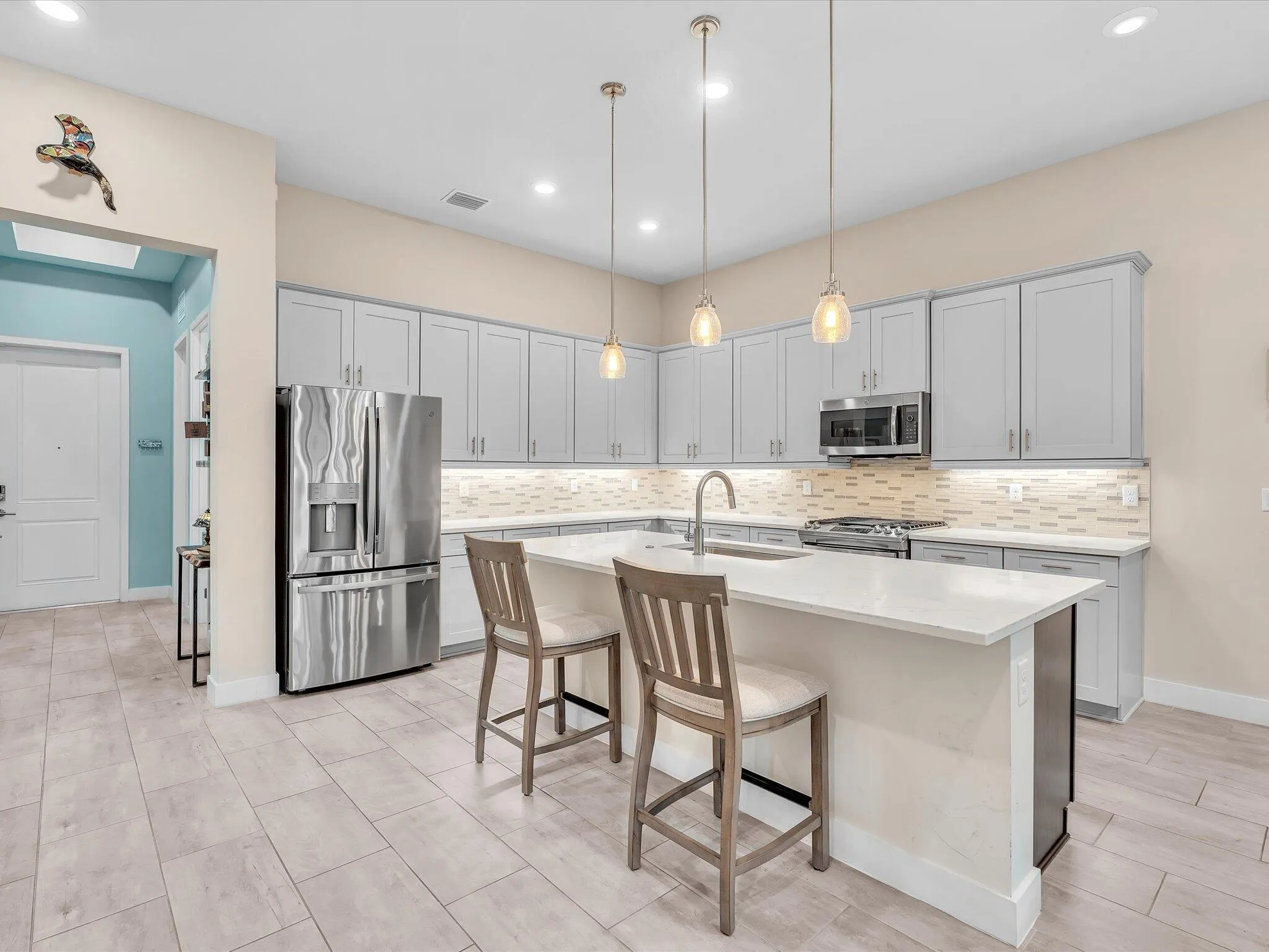 Quartz counter-tops with upgraded cabinetry