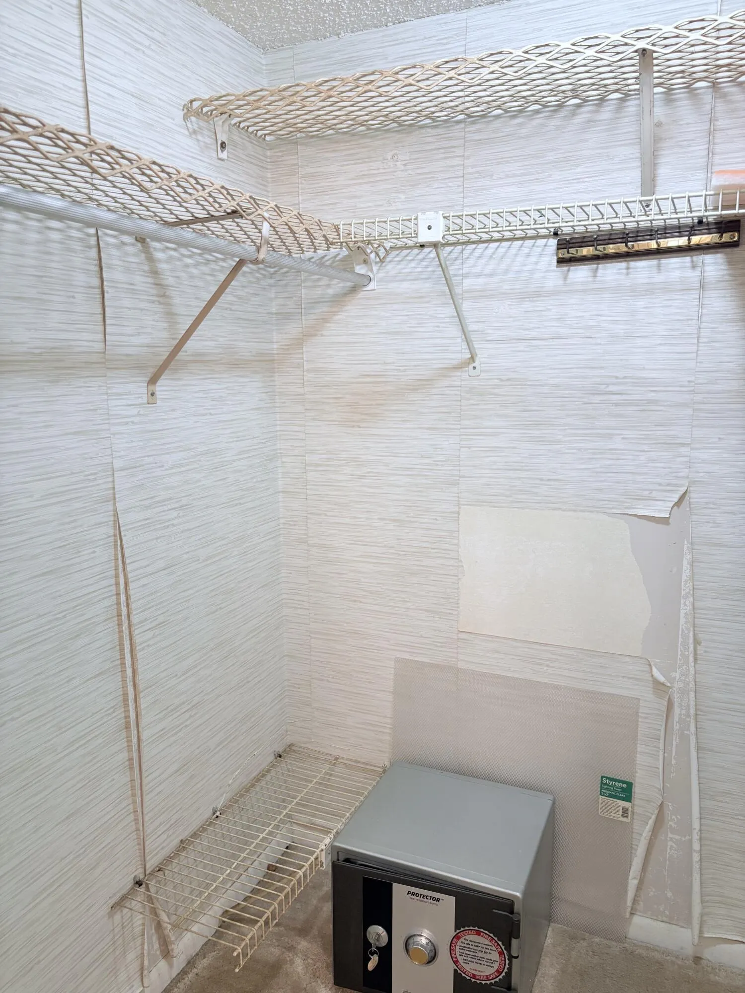 Large walk in closet in master bedroom.