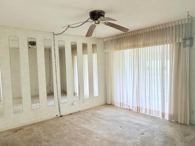 Master bedroom with sliders out to the porch.