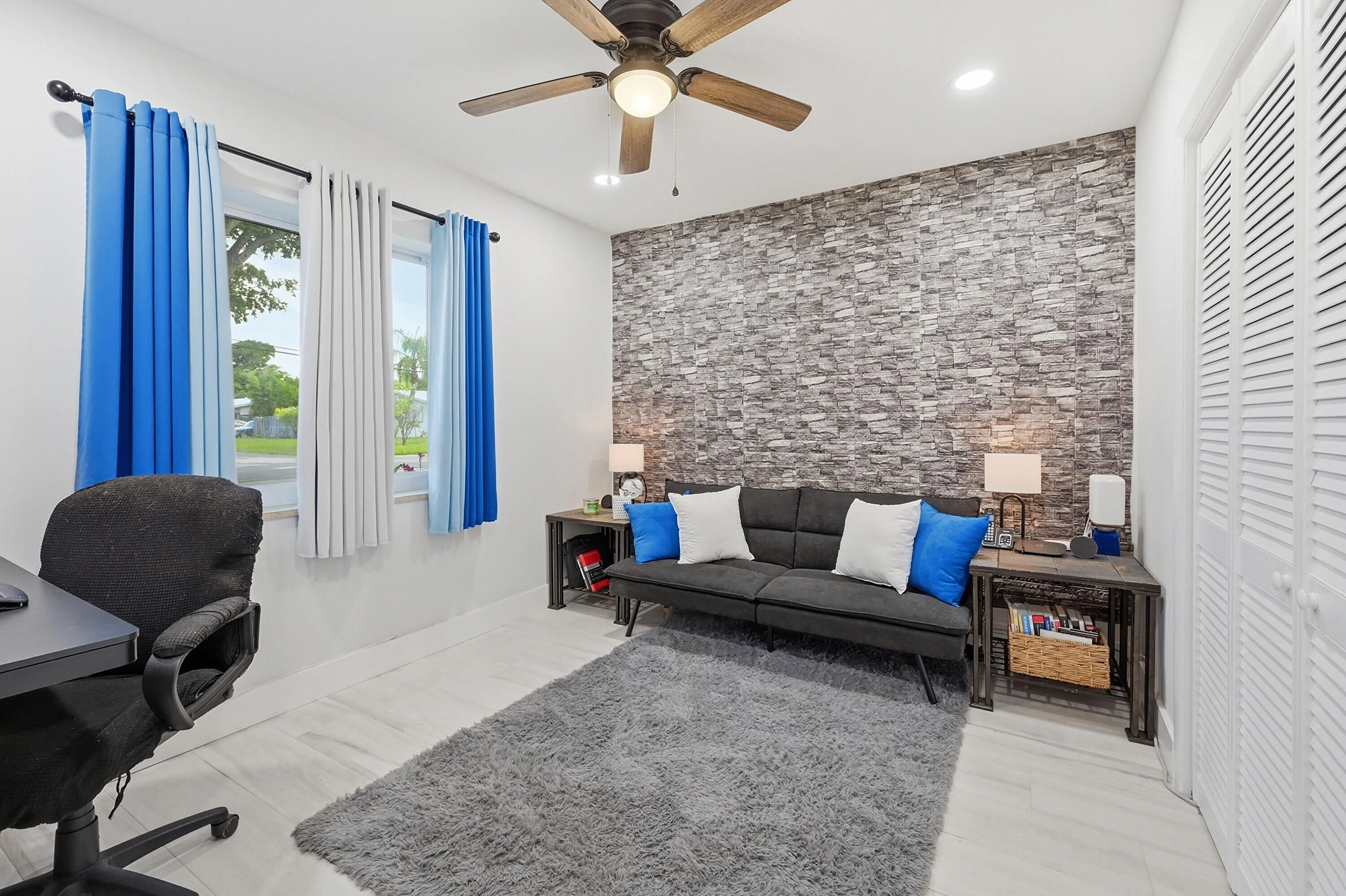 Bright and inviting bedroom with generous space for family, guests, or a home office.