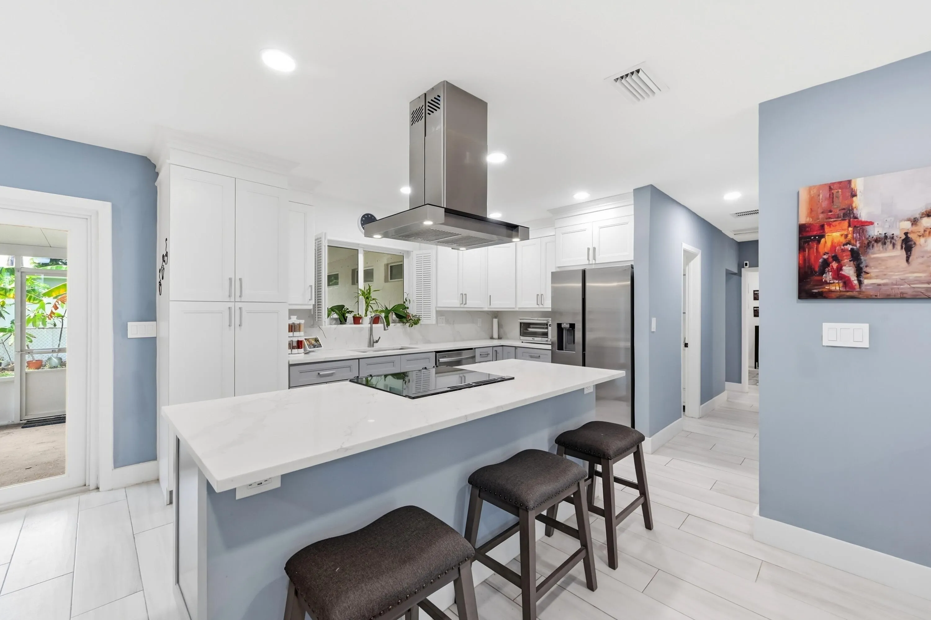 Abundant workspace, quality finishes, and thoughtful updates make this kitchen as practical as it is inviting.