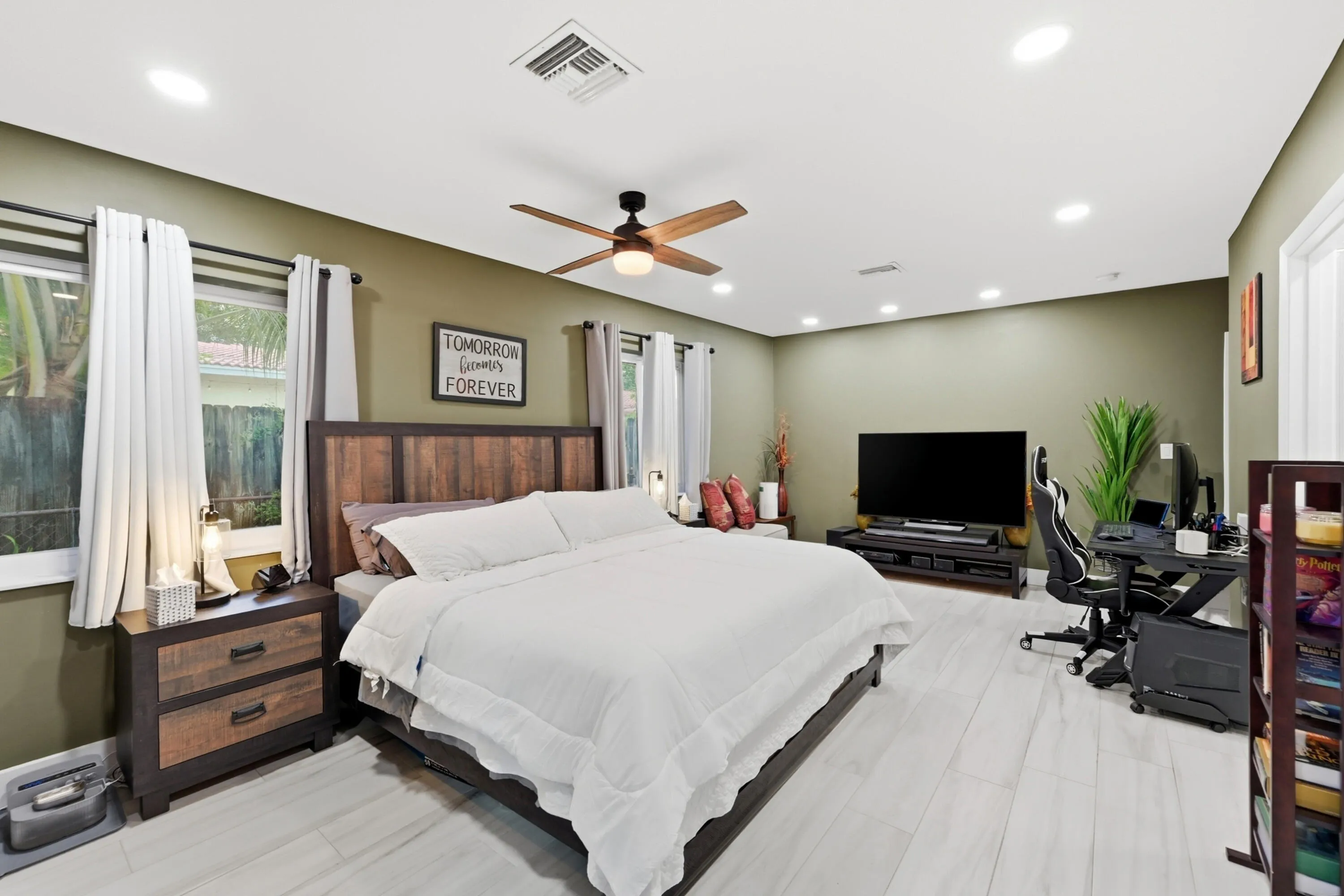 The oversized primary suite provides the perfect balance of space, comfort, and everyday luxury.